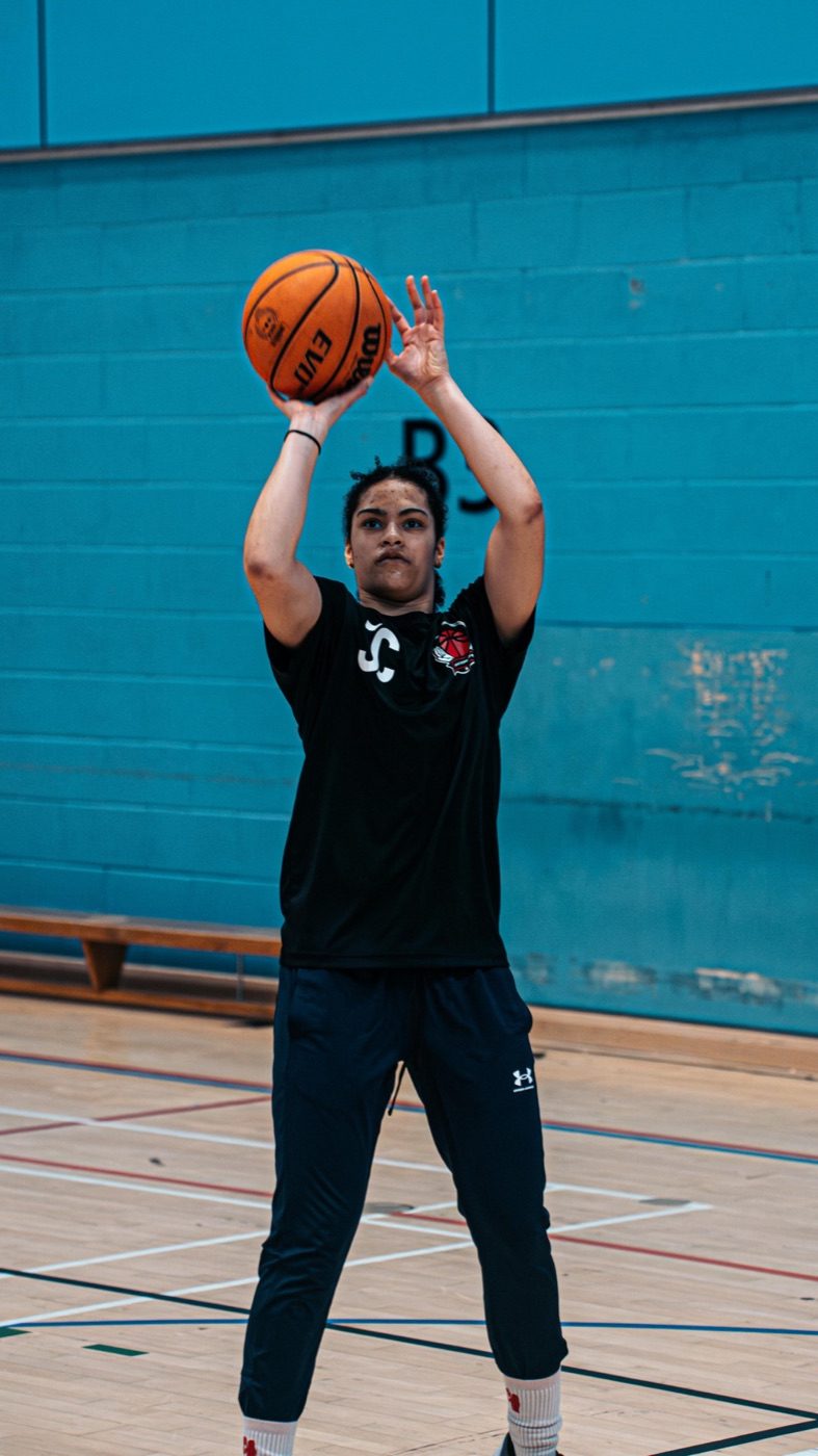 Player lining up a shot in the sports hall